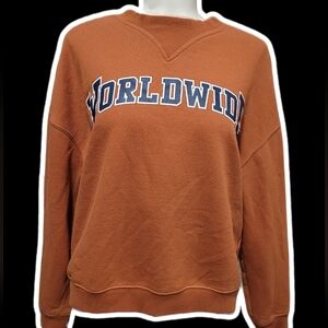 ardene rust colored aesthetic 'worldwide' 2010s sweatshirt ₊˚⊹ ᰔ